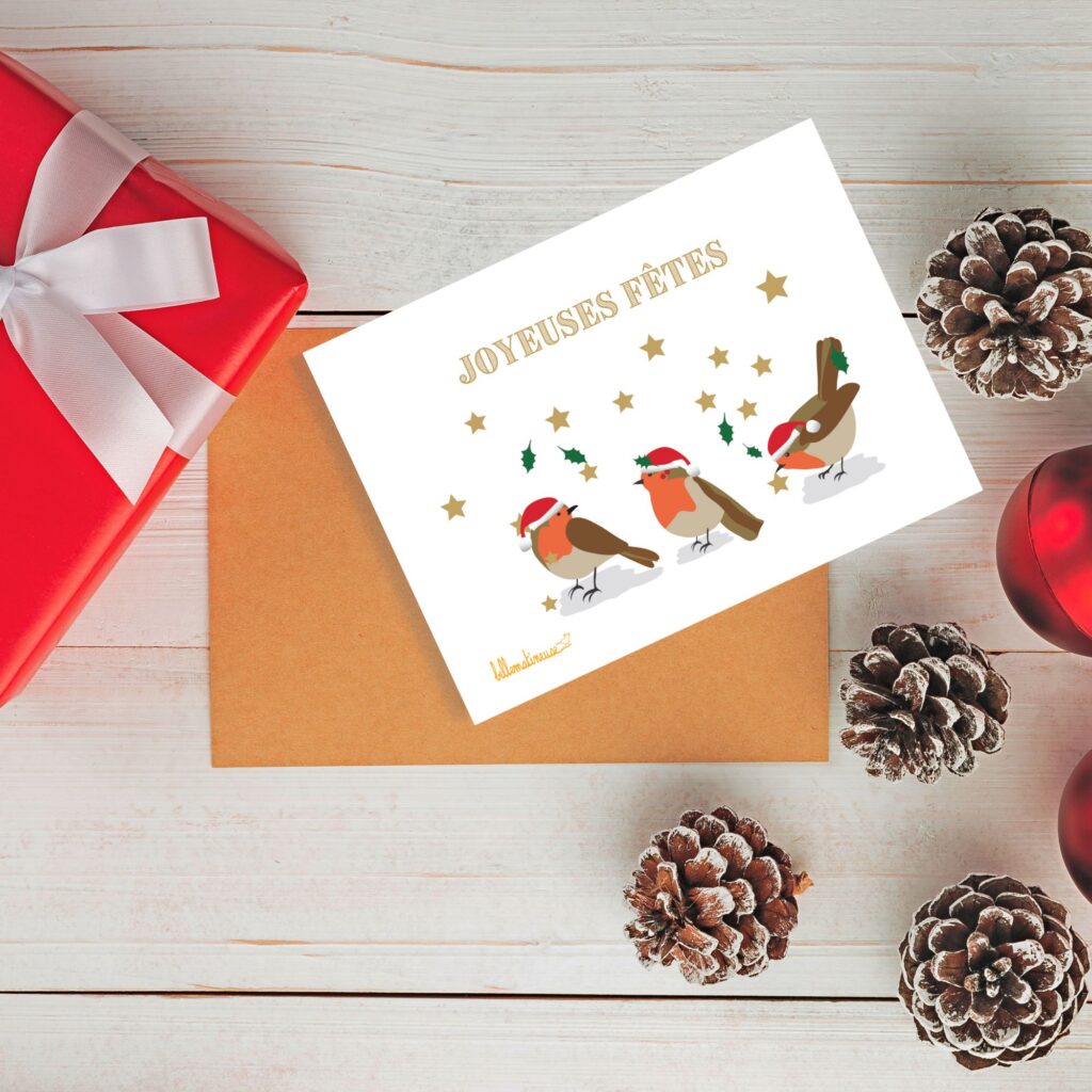 Carte de voeux Joyeuses fêtes avec trois adorables rouge-gorges au bonnet rouge de père Noël